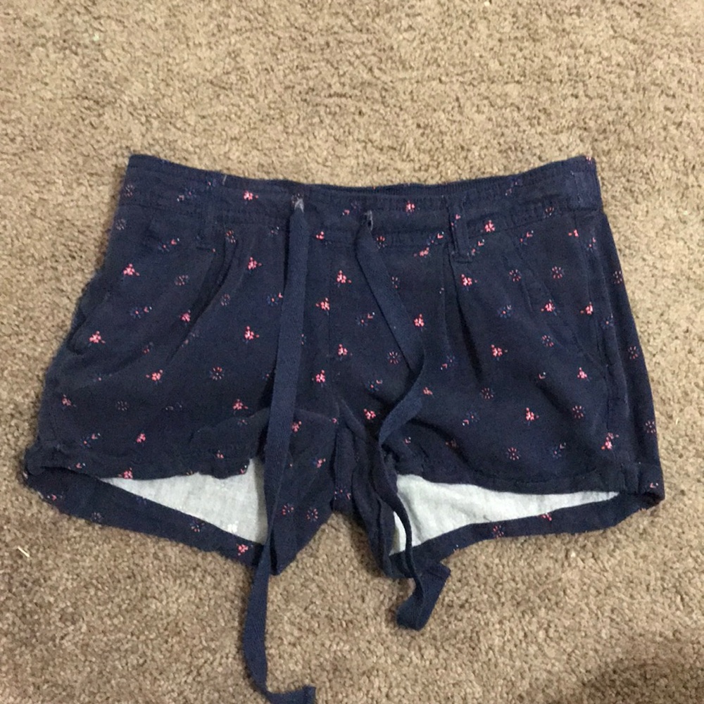 Navy blue shorts.